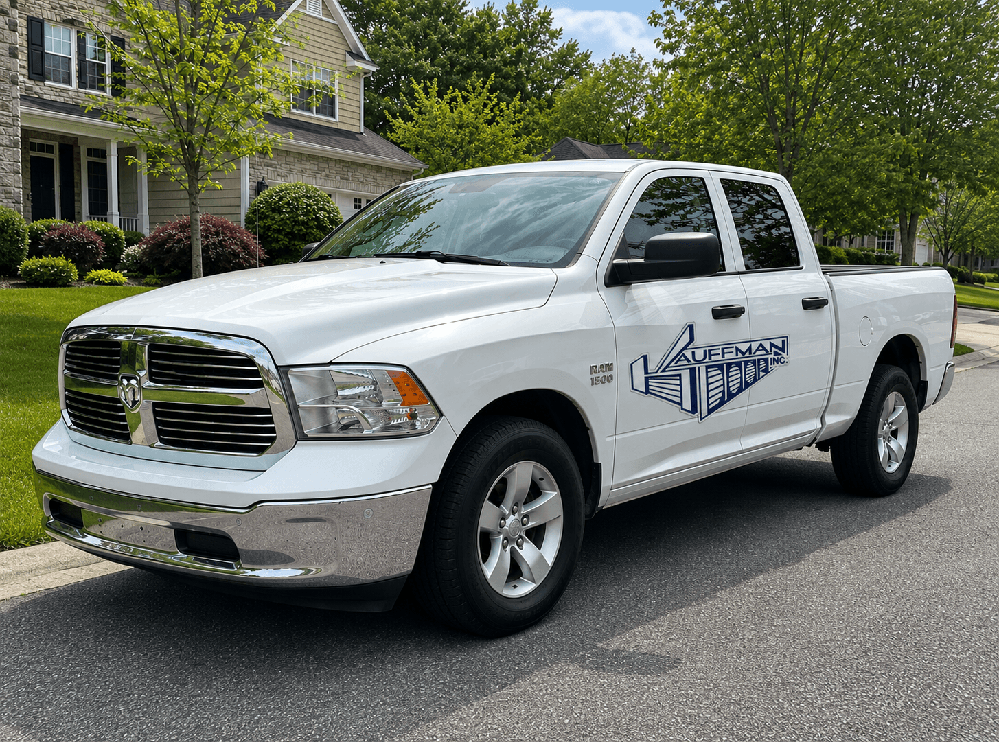 A Kauffman garage doors white Dodge pick up truck.