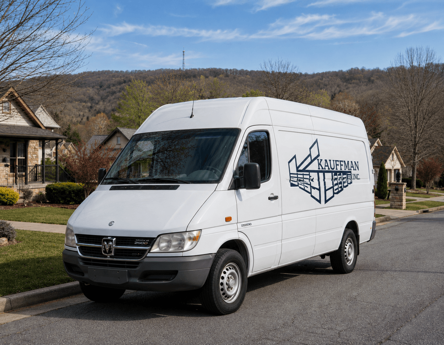 A Kauffman garage doors company Sprinter van.